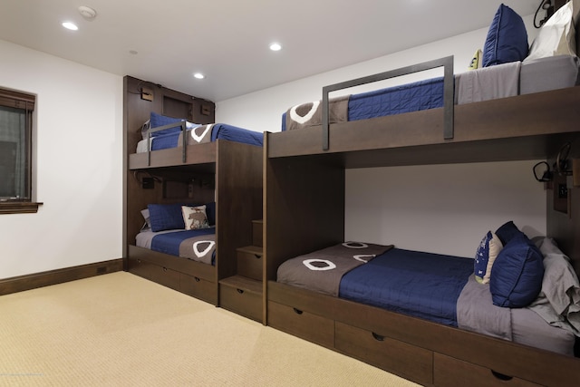 bedroom featuring recessed lighting, carpet flooring, and baseboards