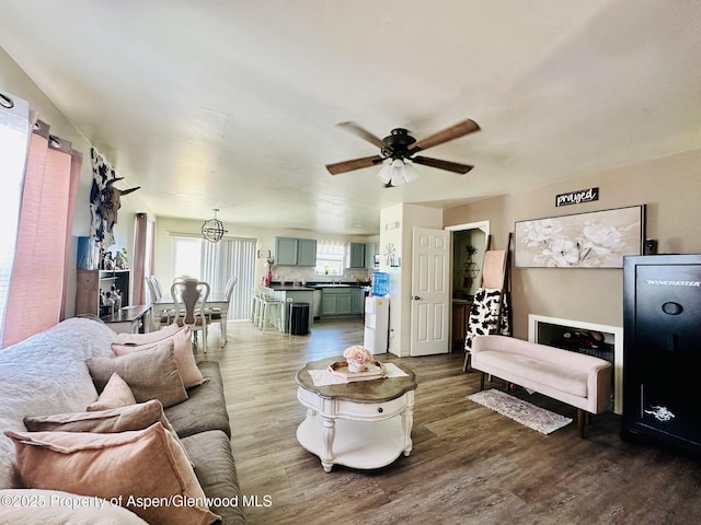 2529 Meadow Cir, Rifle, CO 81650 - living area with wood finished floors and a ceiling fan