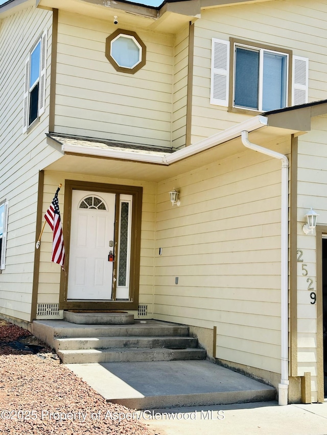 2529 Meadow Cir, Rifle, CO 81650 - property entrance with a security system