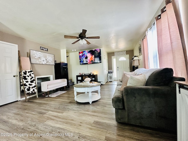 2529 Meadow Cir, Rifle, CO 81650 - living area featuring wood finished floors and ceiling fan