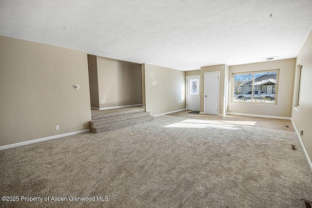 interior space featuring a textured ceiling