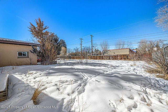 view of snowy yard