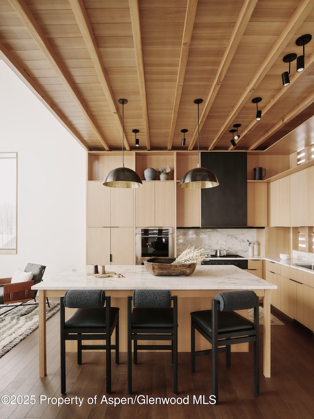 kitchen with modern cabinets, stainless steel oven, backsplash, beamed ceiling, and decorative light fixtures