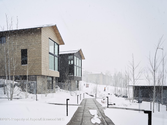 view of snow covered property