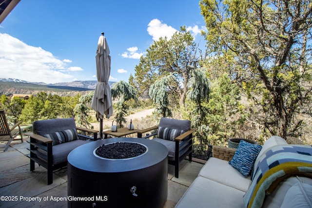 236 Paintbrush Way, Glenwood Springs, CO 81601 - view of patio featuring an outdoor living space with a fire pit and a mountain view