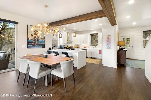236 Paintbrush Way, Glenwood Springs, CO 81601 - dining space with recessed lighting, beamed ceiling, dark wood finished floors, and an inviting chandelier