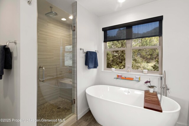 236 Paintbrush Way, Glenwood Springs, CO 81601 - full bath with a freestanding bath, a stall shower, recessed lighting, and wood finished floors