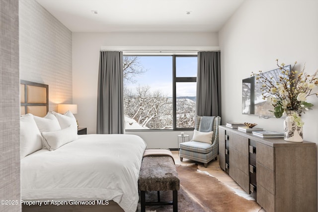 bedroom featuring light hardwood / wood-style floors