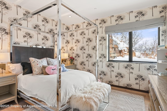 bedroom featuring hardwood / wood-style floors