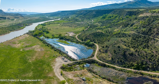 aerial view with a water and mountain view