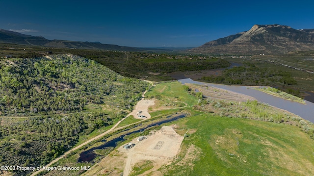 bird's eye view featuring a water and mountain view