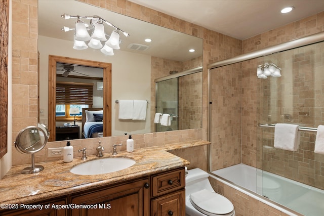610 S W End St Unit D203, Aspen, CO 81611 - full bathroom with ensuite bath, tiled shower / bath, vanity, toilet, and a ceiling fan