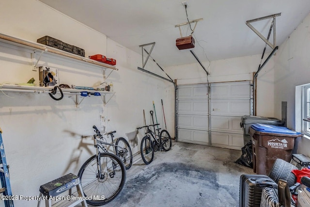garage featuring a garage door opener