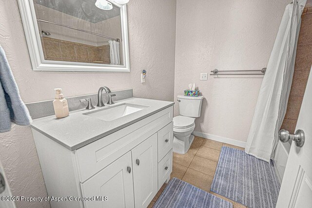 1321 Lecuyer Dr, Craig, CO 81625 - bathroom with vanity, a textured wall, toilet, a shower with curtain, and tile patterned flooring