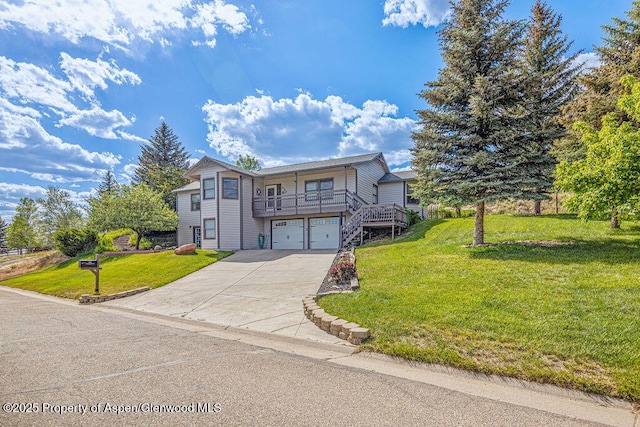 1321 Lecuyer Dr, Craig, CO 81625 - view of front of property with an attached garage, concrete driveway, and a front lawn
