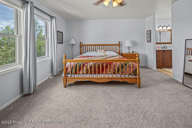 1321 Lecuyer Dr, Craig, CO 81625 - bedroom featuring carpet flooring, baseboards, and a ceiling fan