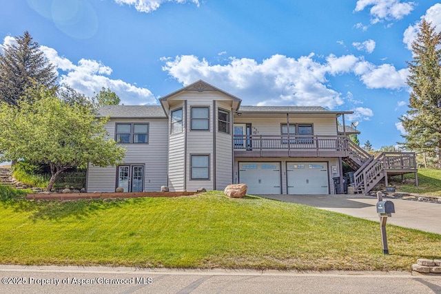 1321 Lecuyer Dr, Craig, CO 81625 - view of front of property featuring driveway, a front yard, and a garage