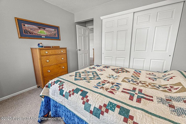 1321 Lecuyer Dr, Craig, CO 81625 - bedroom featuring carpet floors, a closet, a textured ceiling, and baseboards