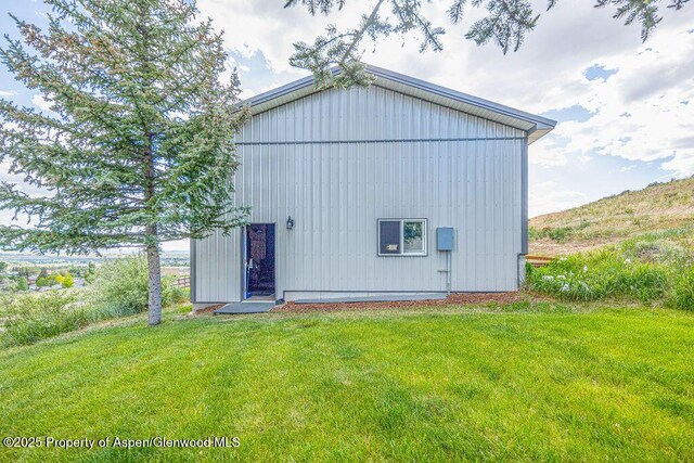 1321 Lecuyer Dr, Craig, CO 81625 - rear view of property featuring a yard