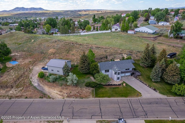 1321 Lecuyer Dr, Craig, CO 81625 - view from above of property featuring a mountainous background