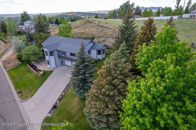 1321 Lecuyer Dr, Craig, CO 81625 - aerial view of property and surrounding area with a mountain backdrop