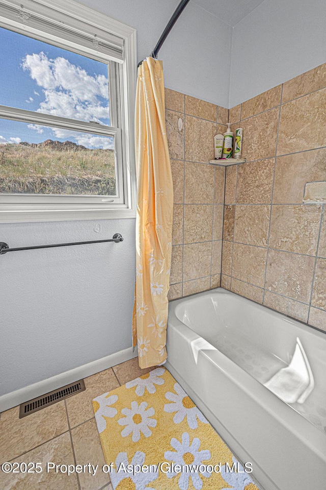 1321 Lecuyer Dr, Craig, CO 81625 - full bath featuring shower / bathtub combination with curtain and baseboards