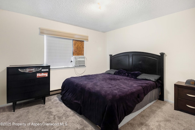 bedroom with light carpet, a textured ceiling, and cooling unit