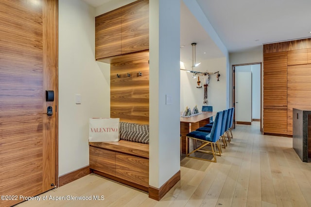 45 Wood Rd Unit 301, Snowmass Village, CO 81615 - hallway with light wood-style flooring and baseboards