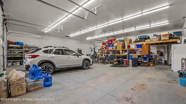 garage with white fridge