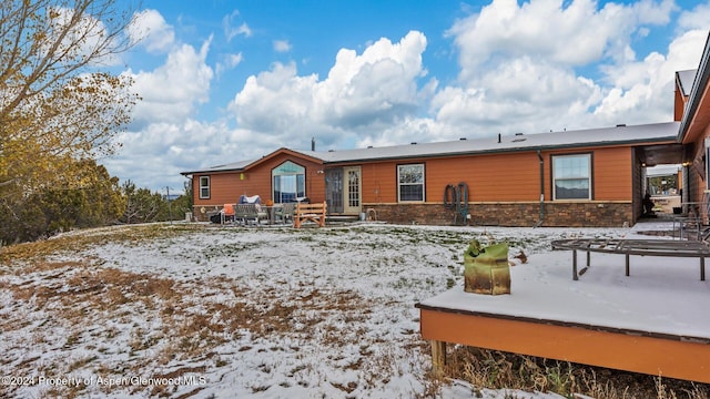 view of snow covered property