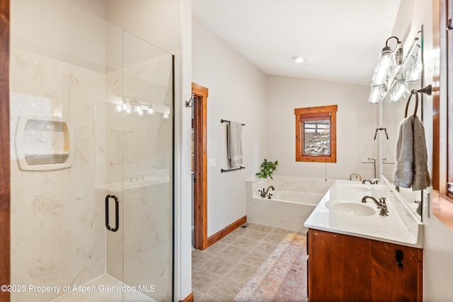 bathroom with shower with separate bathtub, vanity, and vaulted ceiling