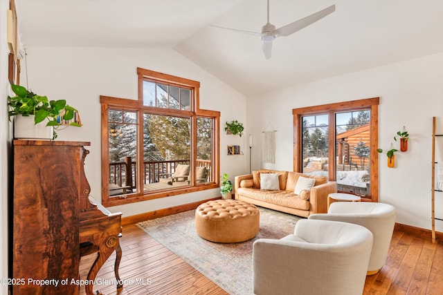 sitting room featuring wood-type flooring, ceiling fan, and vaulted ceiling