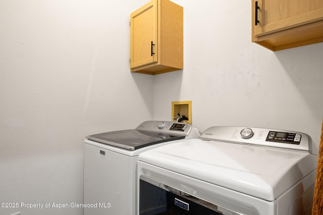 100 Limberpine Cir, Parachute, CO 81635 - laundry room with cabinet space and washer and clothes dryer