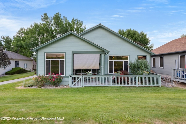 100 Limberpine Cir, Parachute, CO 81635 - rear view of property featuring a lawn