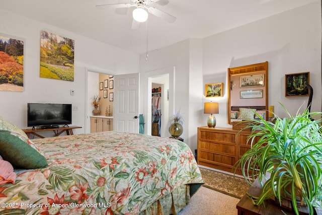 100 Limberpine Cir, Parachute, CO 81635 - carpeted bedroom featuring a walk in closet and a ceiling fan