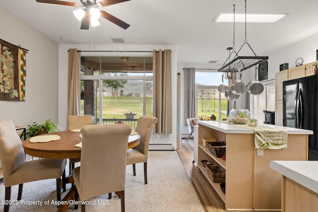 100 Limberpine Cir, Parachute, CO 81635 - dining space featuring a baseboard radiator and a ceiling fan