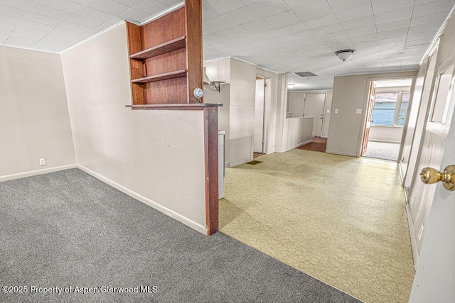 415 Tucker St, Craig, CO 81625 - corridor with baseboards and carpet flooring
