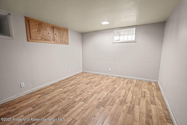 415 Tucker St, Craig, CO 81625 - basement featuring light wood-style flooring and baseboards