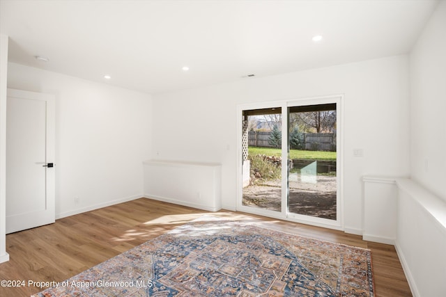 unfurnished room featuring light wood-type flooring