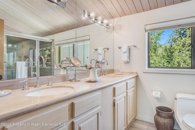 851 Ute Ave Unit B, Aspen, CO 81611 - bathroom featuring double vanity, wooden ceiling, and tile patterned floors