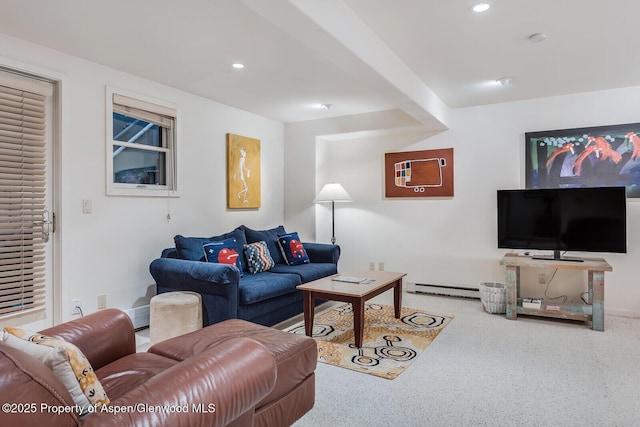 851 Ute Ave Unit B, Aspen, CO 81611 - carpeted living room featuring a baseboard radiator, a wall unit AC, and recessed lighting