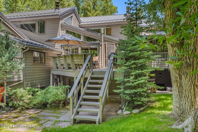 851 Ute Ave Unit B, Aspen, CO 81611 - rear view of house with a standing seam roof, a metal roof, stairs, and a deck
