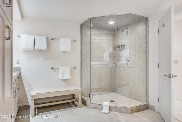 851 Ute Ave Unit B, Aspen, CO 81611 - full bathroom with a shower stall, vanity, and tile patterned floors