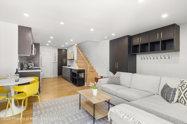 250 S Original St Unit B, Aspen, CO 81611 - living room featuring light wood-style flooring, stairs, and recessed lighting