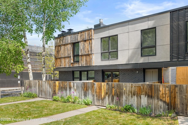 250 S Original St Unit B, Aspen, CO 81611 - view of front of home featuring brick siding and stucco siding
