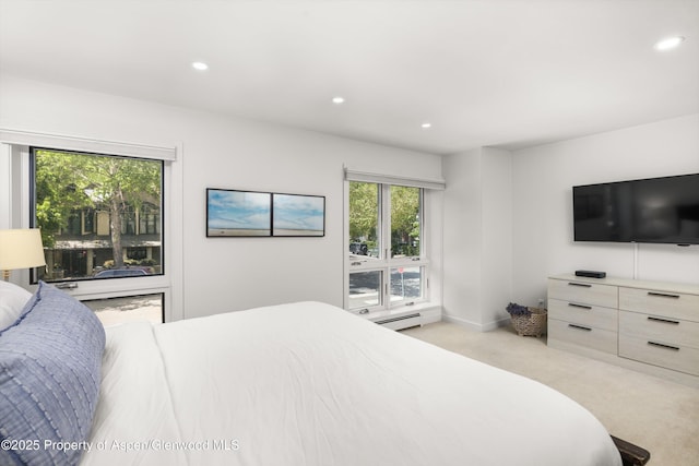 250 S Original St Unit B, Aspen, CO 81611 - bedroom featuring recessed lighting, light colored carpet, a baseboard heating unit, and baseboards
