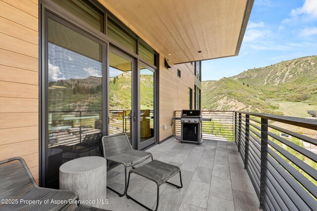 77 Wood Rd Unit 507-13, Snowmass Village, CO 81615 - balcony with a grill and a mountain view