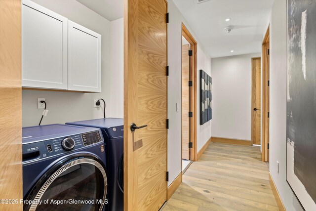 77 Wood Rd Unit 507-13, Snowmass Village, CO 81615 - laundry room featuring washing machine and dryer, cabinet space, light wood finished floors, baseboards, and recessed lighting