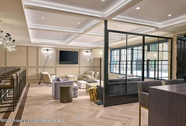 77 Wood Rd Unit 507-13, Snowmass Village, CO 81615 - building lobby featuring a decorative wall, beam ceiling, and coffered ceiling