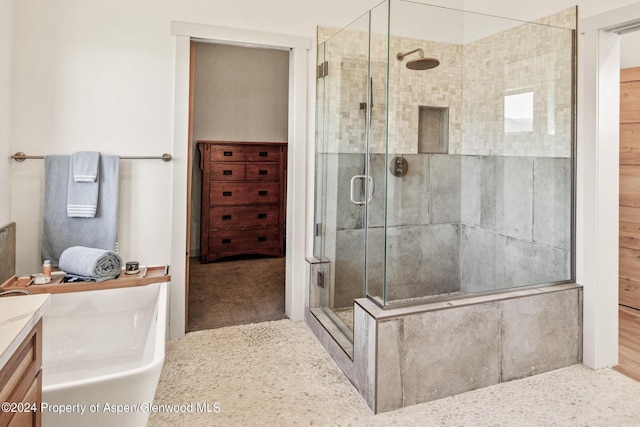 bathroom featuring vanity and walk in shower